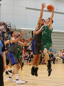 Moycullen's Cian Nihill gets his lay-up away despite the close attentions of Maree's Paul Freeman and Niels Bunschoten.